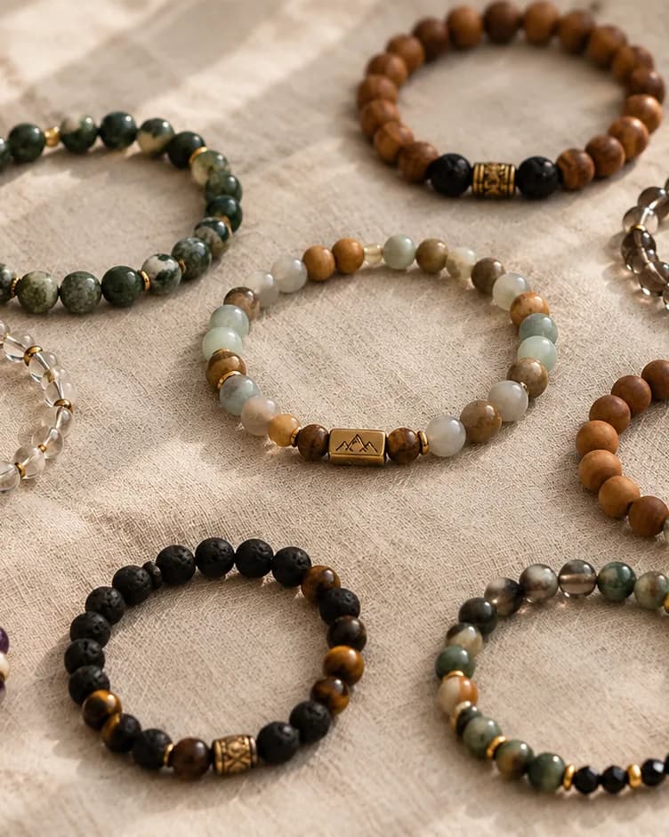 A selection of beaded bracelets in stone, wood, and glass